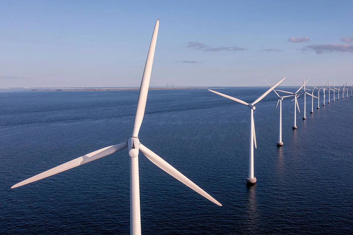 Aerial view of offshore wind turbines at sea