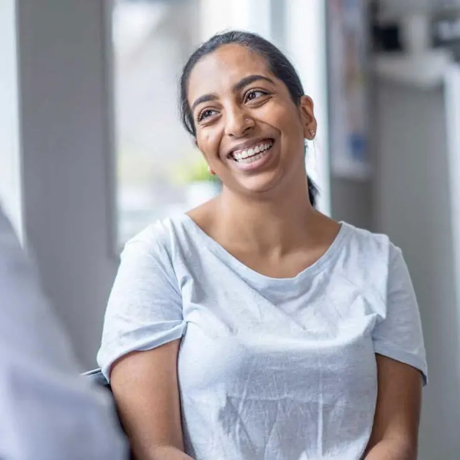 A female patient chats with her doctor