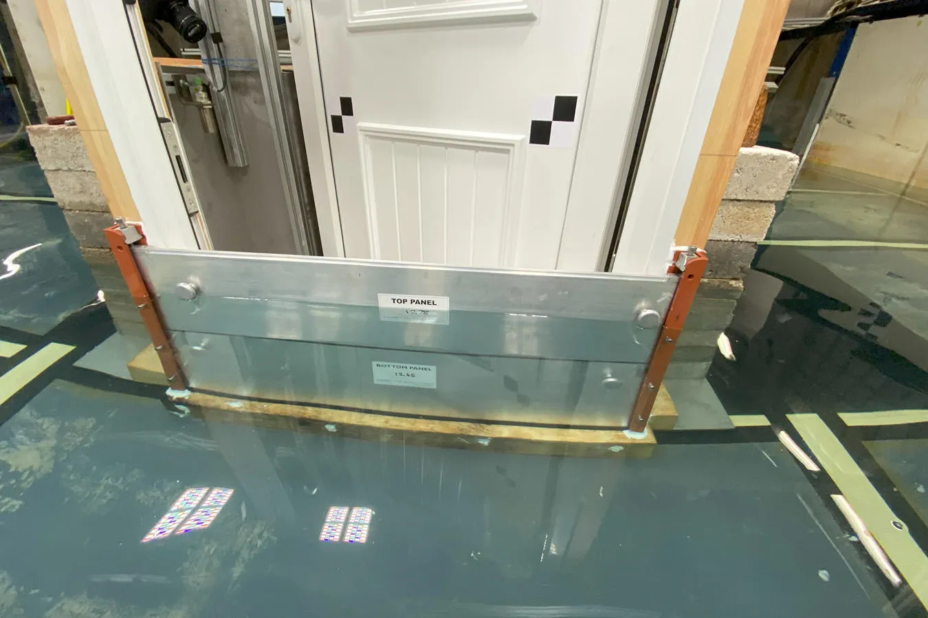 A flood barrier in a testing environment with water 