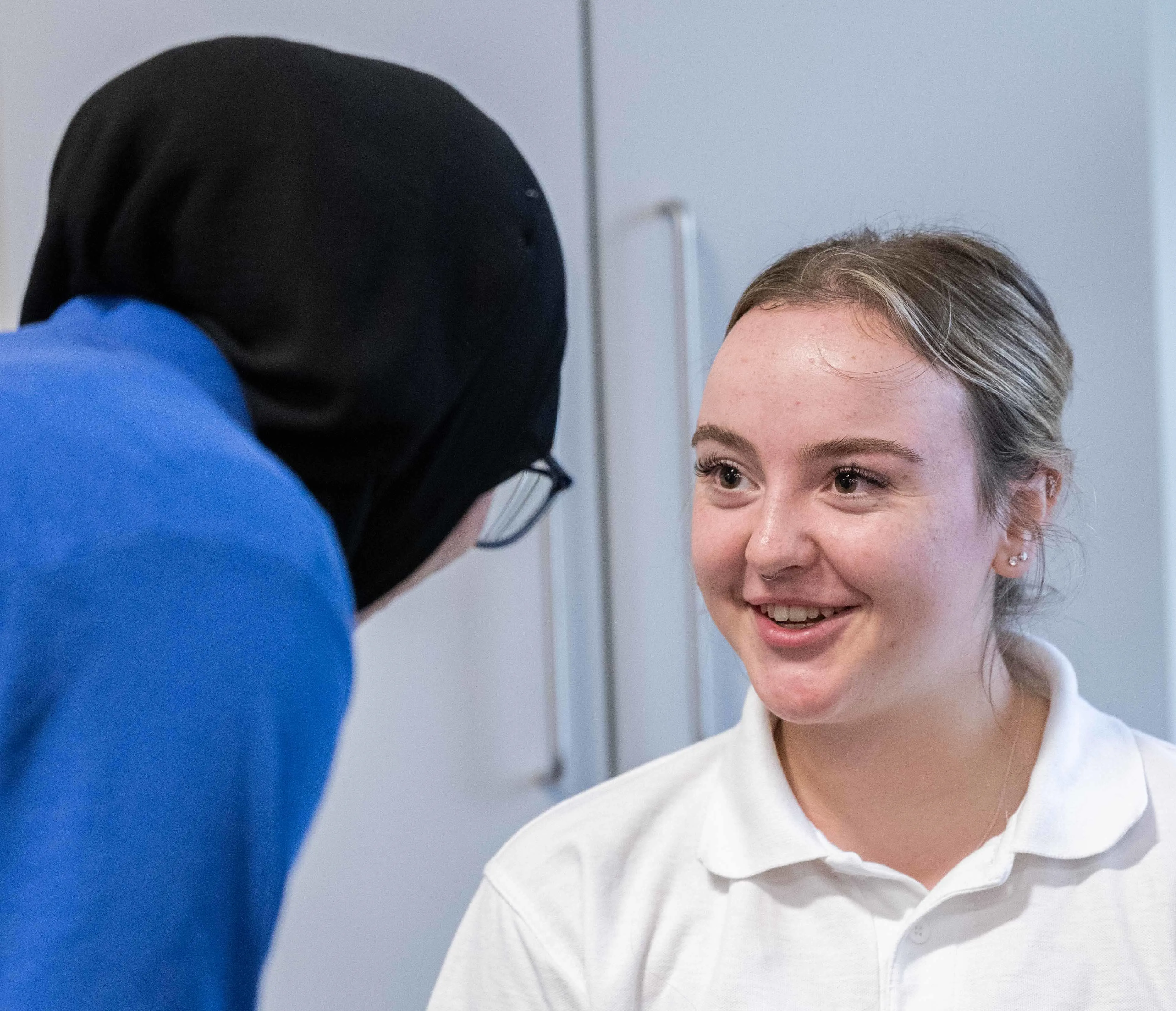 Physiotherapy students in a practical session