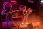 A four member band play a gig in the Polar Bear.