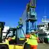 Workers in hi-vis at the port of Hull