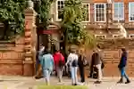 a group of people outside of the historic Wilberforce House