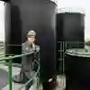 Engineer conducting health and safety visit at fuel storage facility