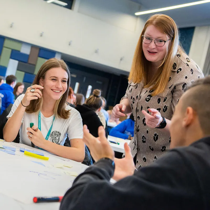 High school students in a workshop with a lecturer