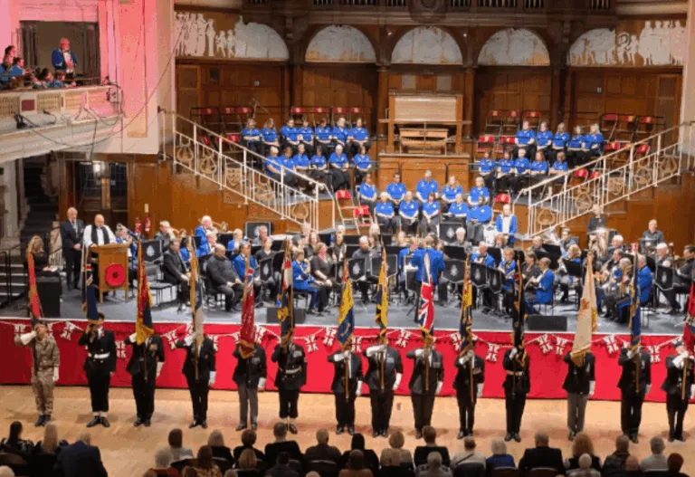 Royal British Legion N & E Yorkshire County Festival Of Remembrance playing instruments on stage