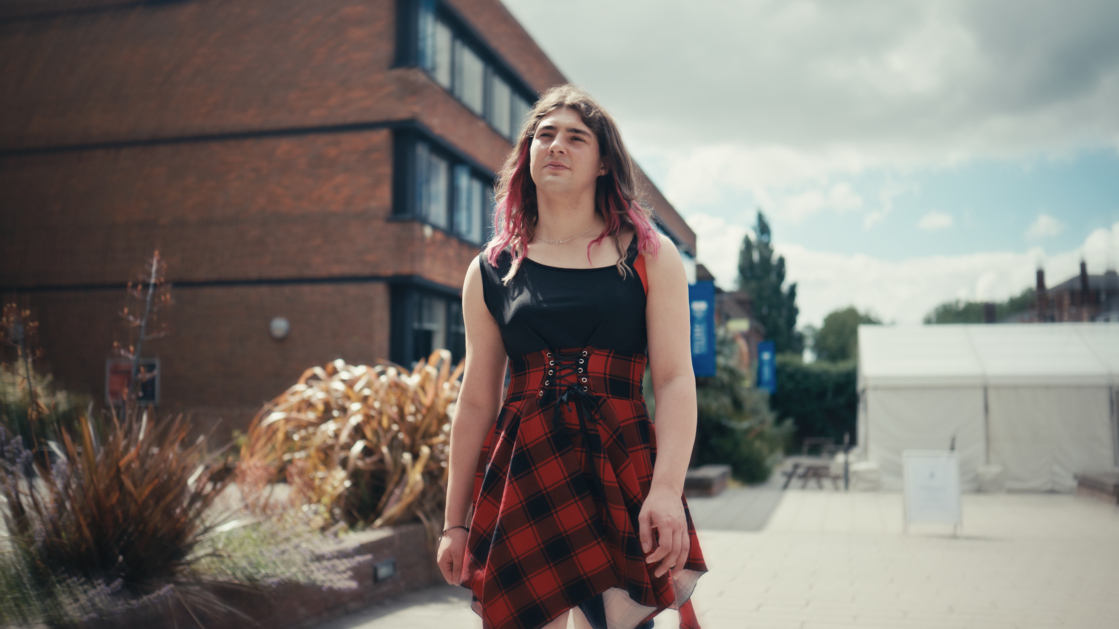 Foundation year student Ruby walking through campus