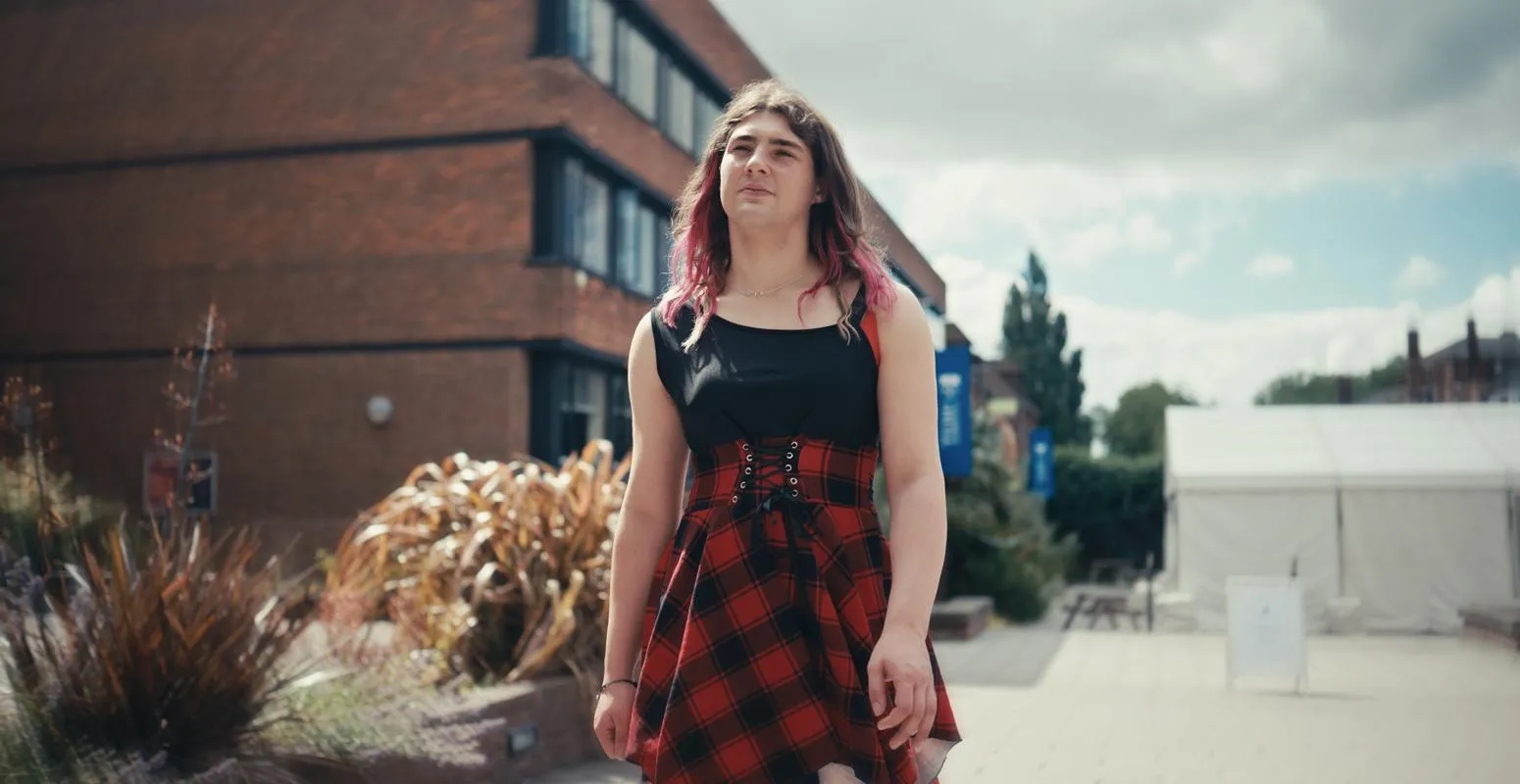 Foundation year student Ruby walking through campus