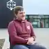 Samuel Rose outside the DAIM building