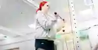 Student stood doing weights