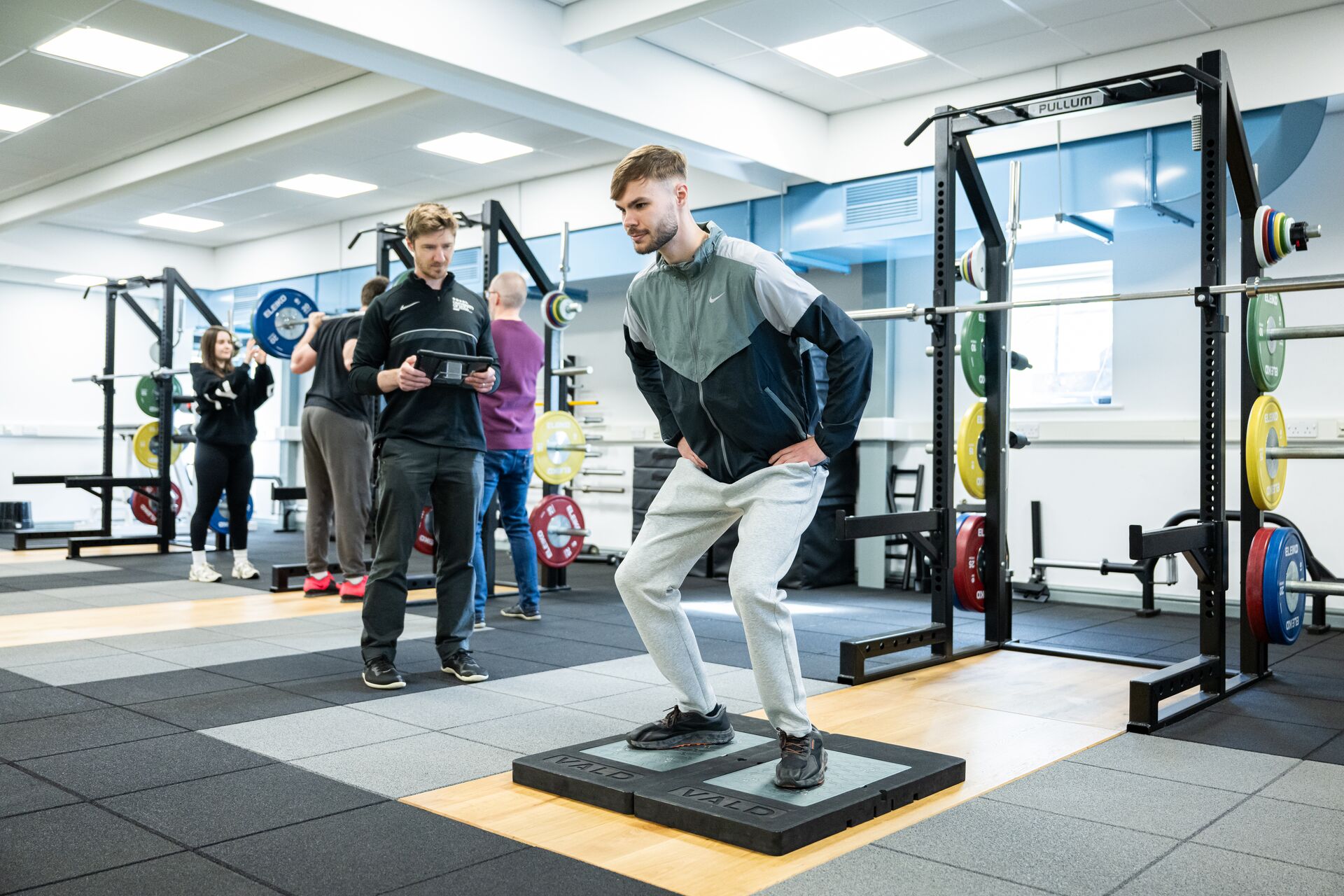 Man performing a jump test on a force plate in the Strength and Conditioning Suite at the University of Hull