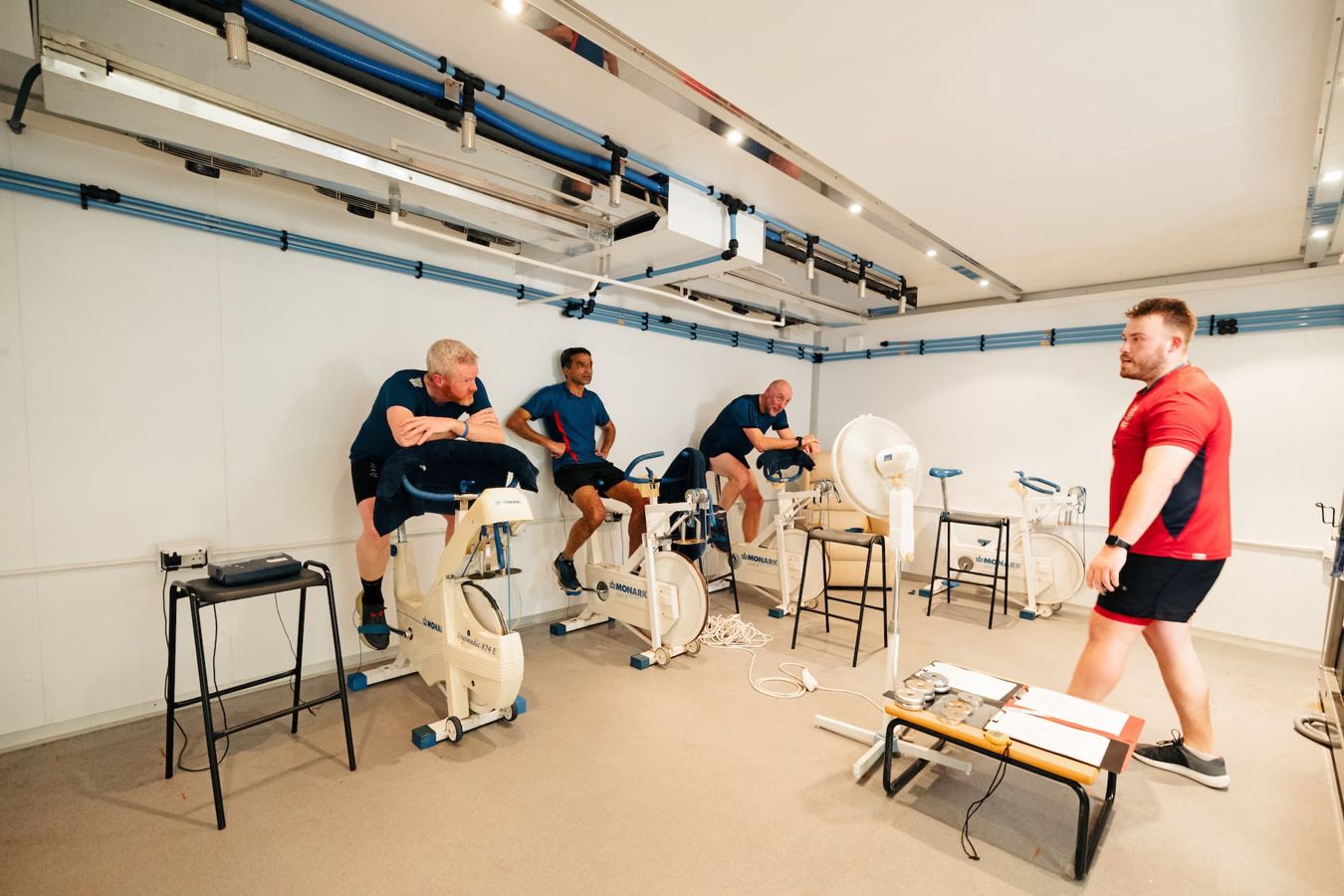 people using the exercise bikes in the Environment Chamber