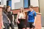 Students Chatting Outside The Courtyard