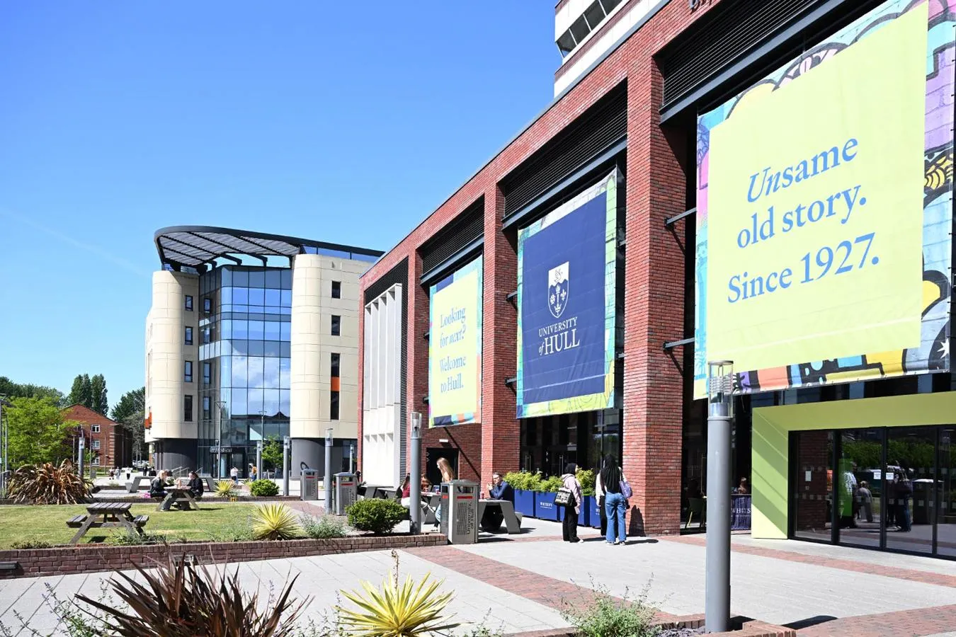 Allam Medical Building and Bymore Jones Library exteriors on a sunny day.