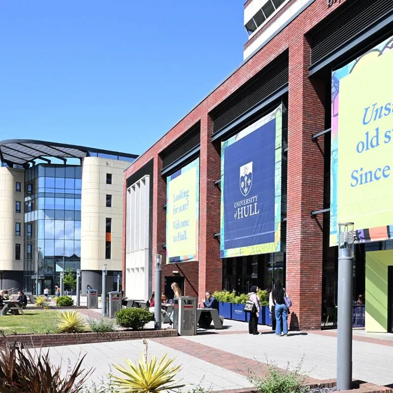Allam Medical Building and Bymore Jones Library exteriors on a sunny day.