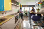 Students in the kitchen area in Taylor Court