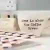 Coffee cup and notepad