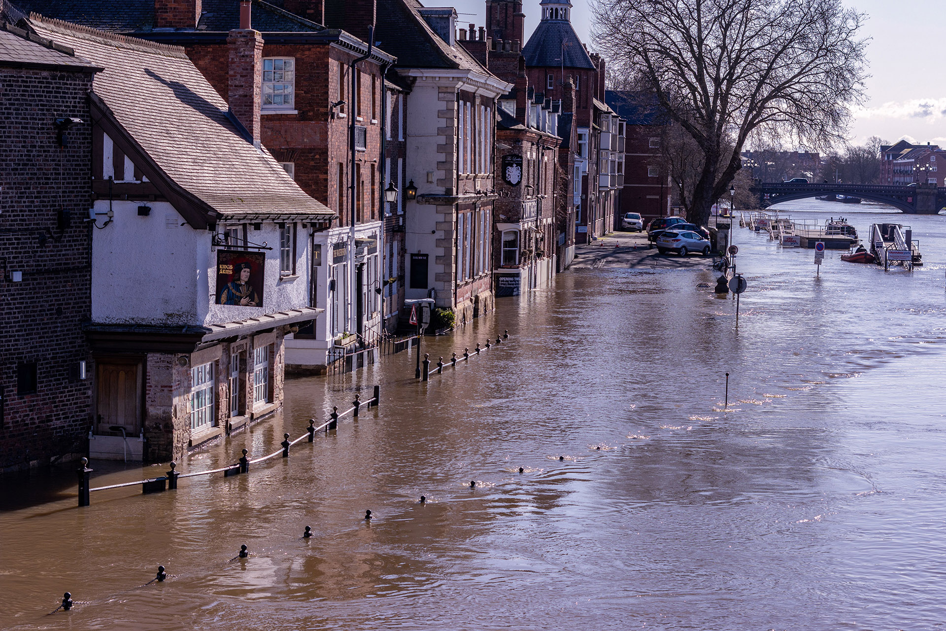 Businesses flooded by river water