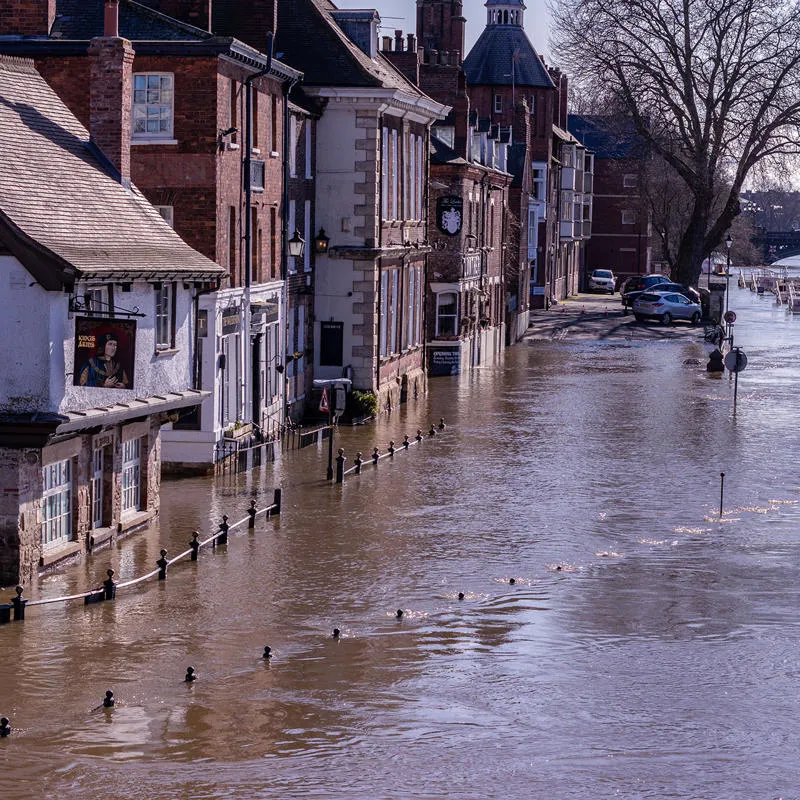 Businesses flooded by river water
