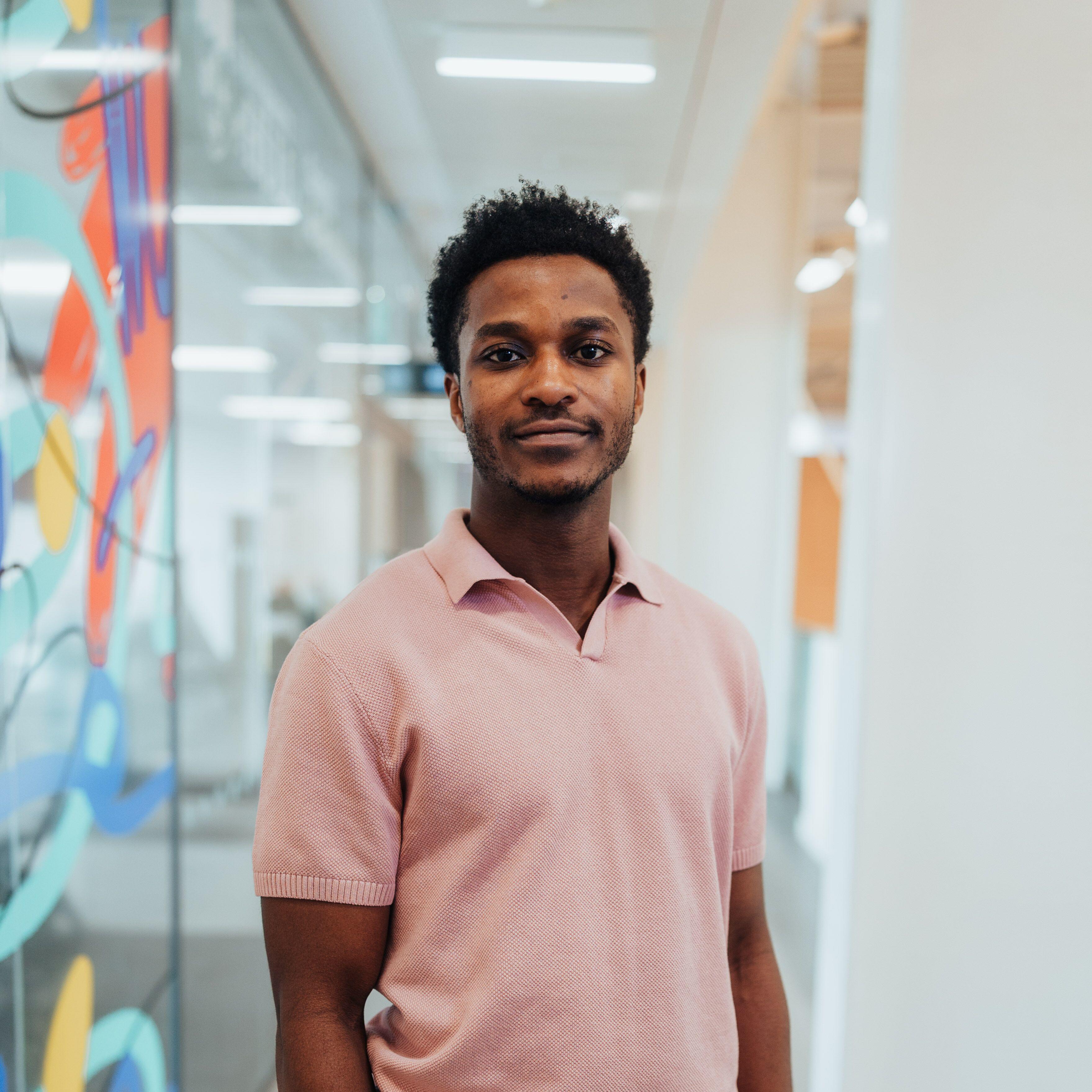 Student standing in the library
