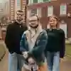 Three students outside Hull University Business School