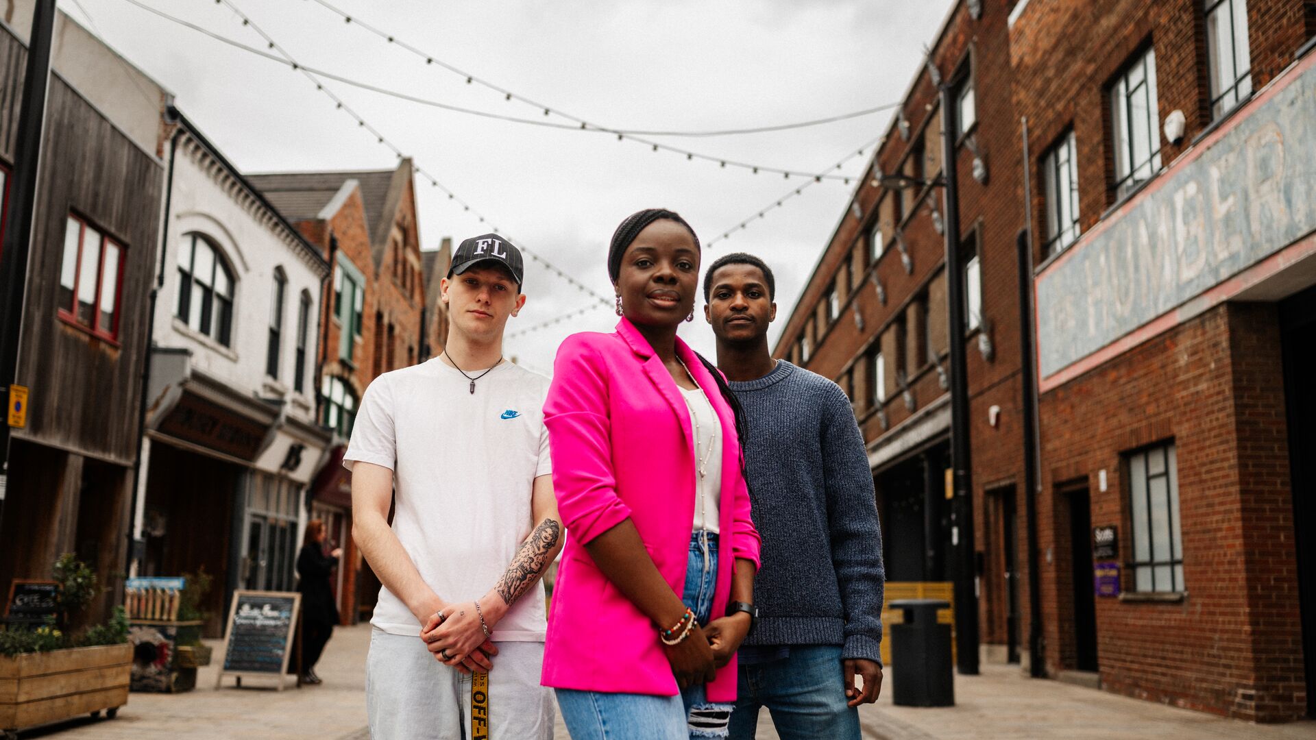 Group of three students stood in central Hull