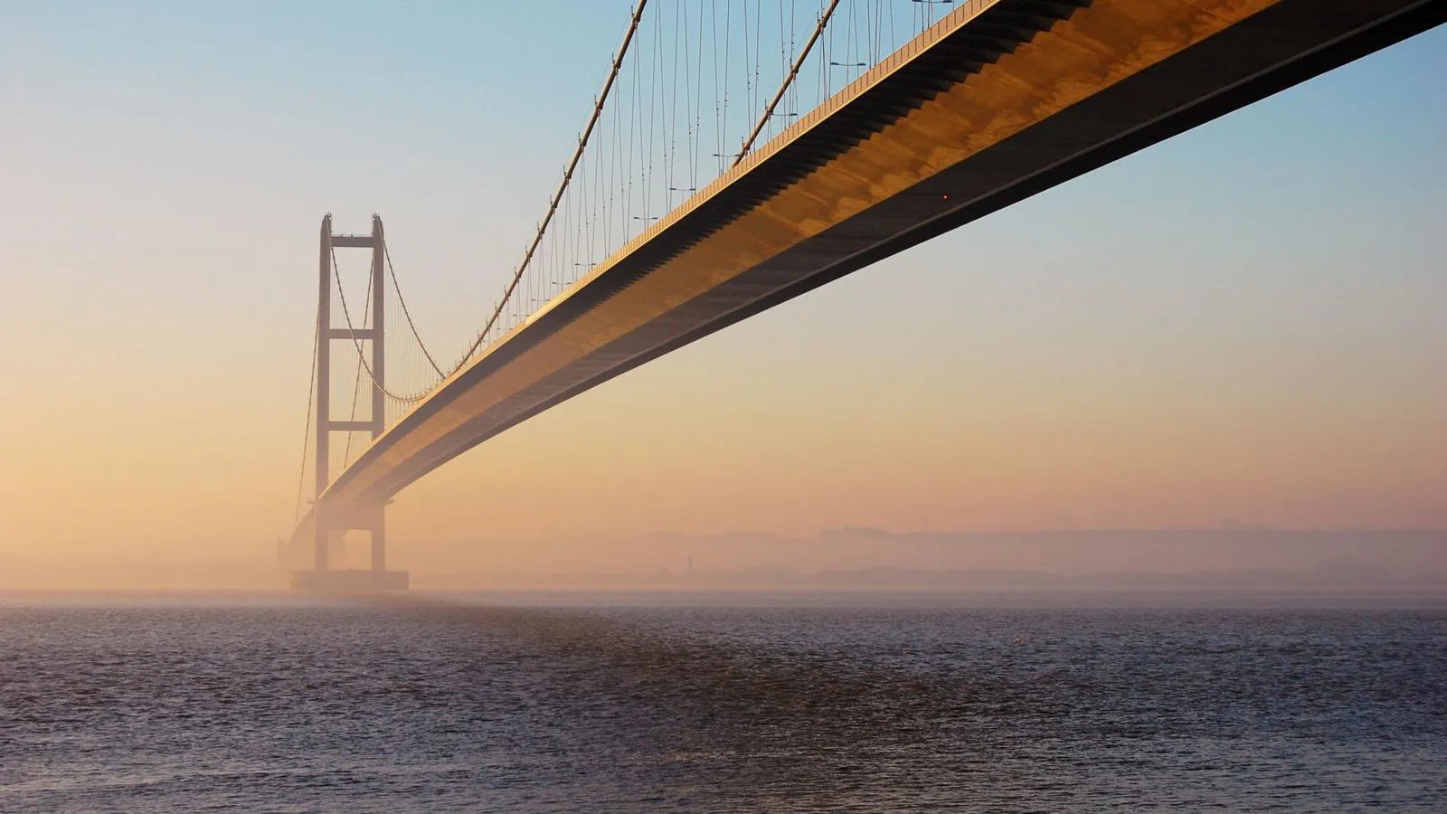 The view from the north bank of the Humber Bridge on the River Humber on a misty morning.