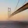 The view from the north bank of the Humber Bridge on the River Humber on a misty morning.