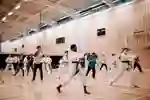 A group doing Karate in the Allam Sports Centre