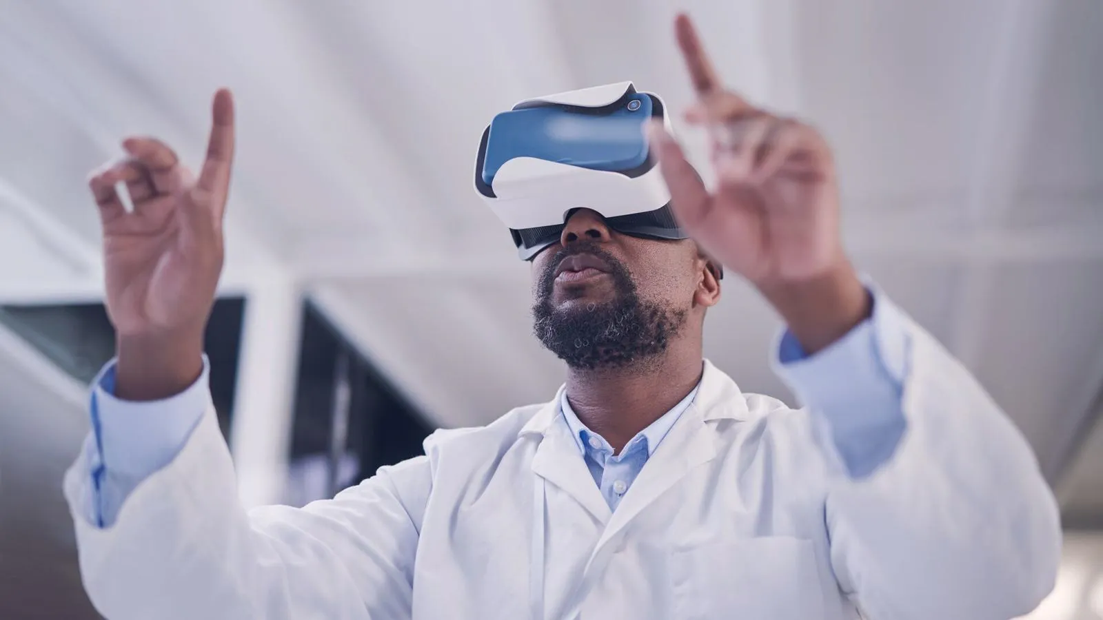 A researcher wearing a lab coat and VR headset