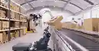 Robots working an assembly line at a factory.