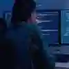 Screens of code, representing the ongoing threat cyberwarfare