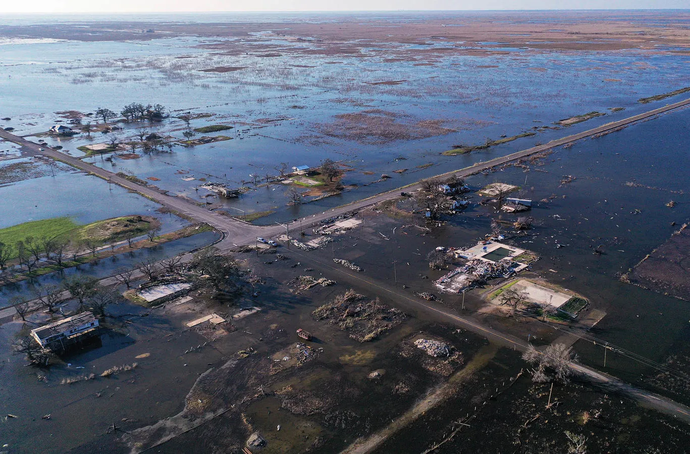 A flooded plain with only roads and buildings visible