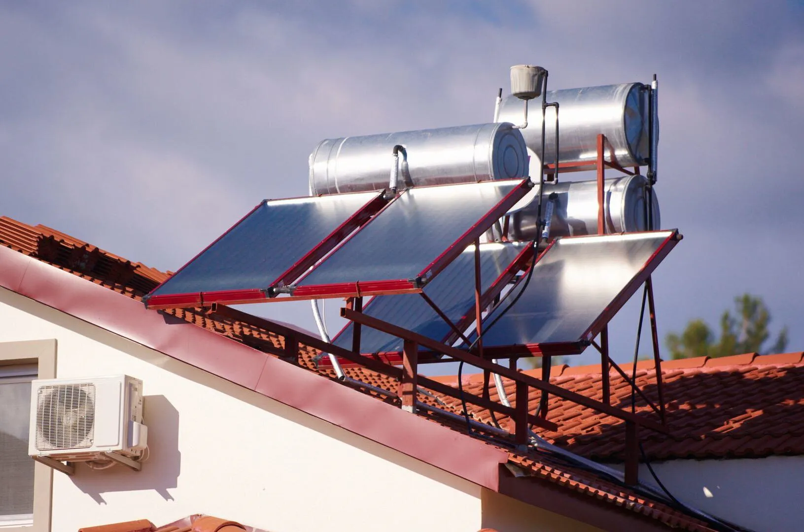 Solar water heater mounted on a house roof
