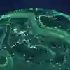The globe covered in interconnected green lights