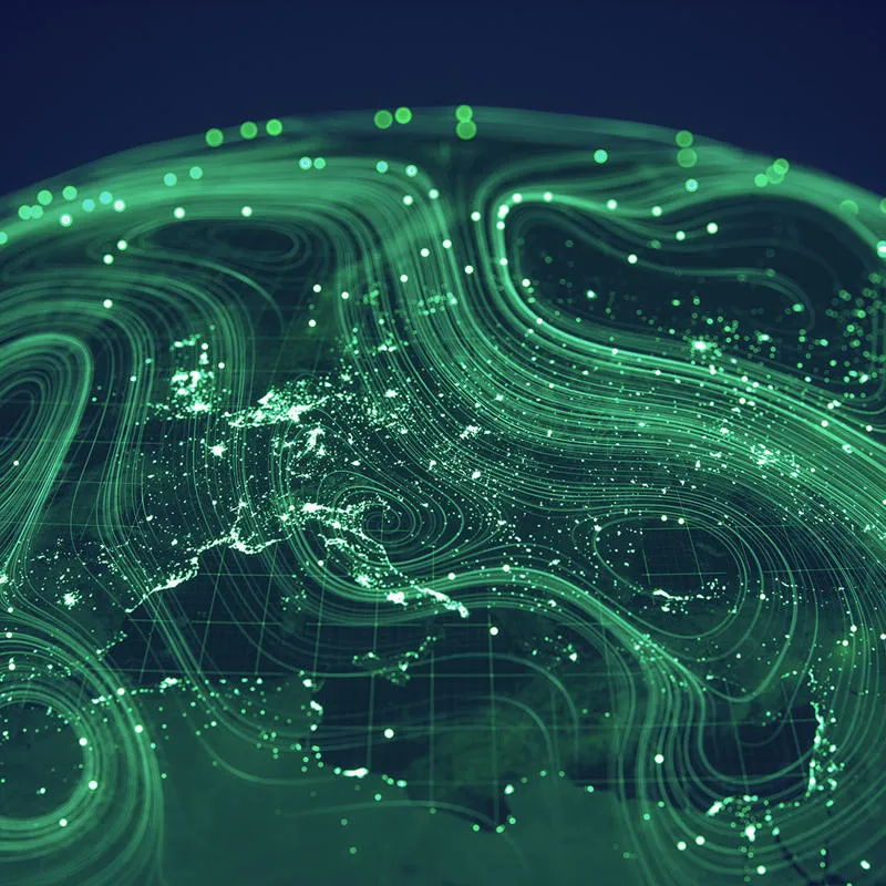 The globe covered in interconnected green lights