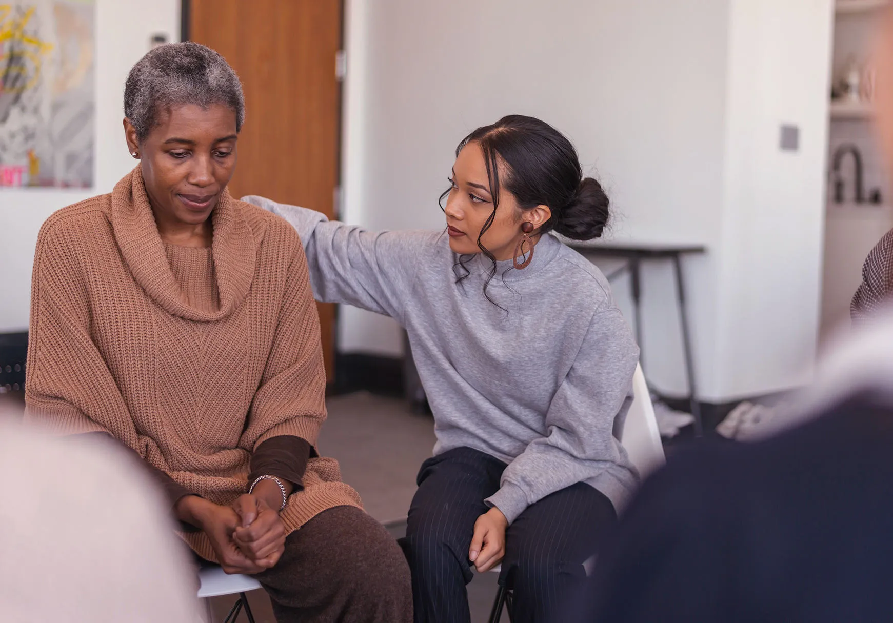 Elderly patient being supported