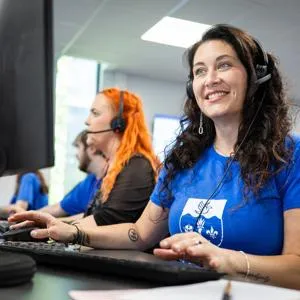 Two Clearing call centre staff on the phone looking for courses for students