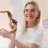 girl holding a shark jawbone