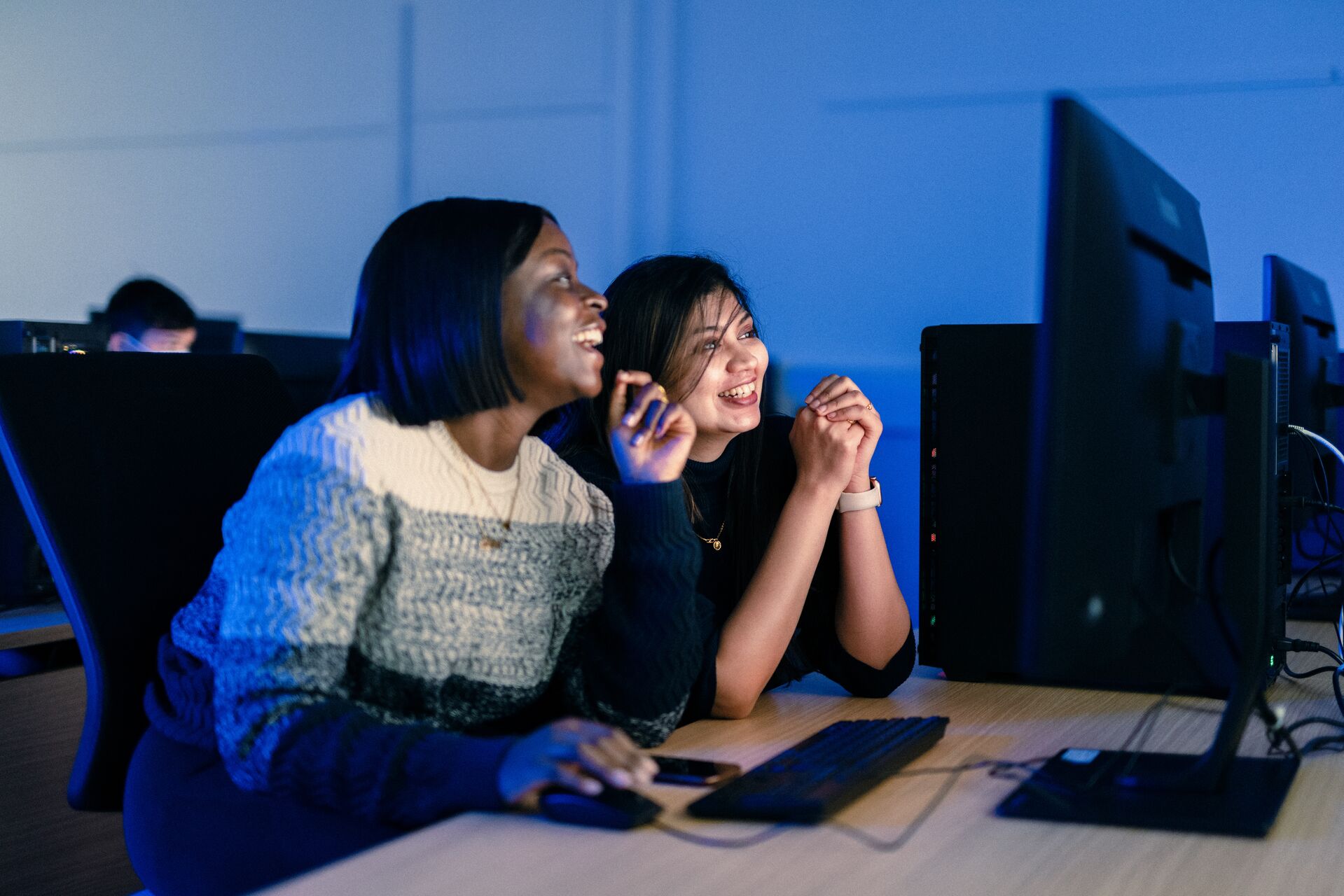 Two students exploring AI