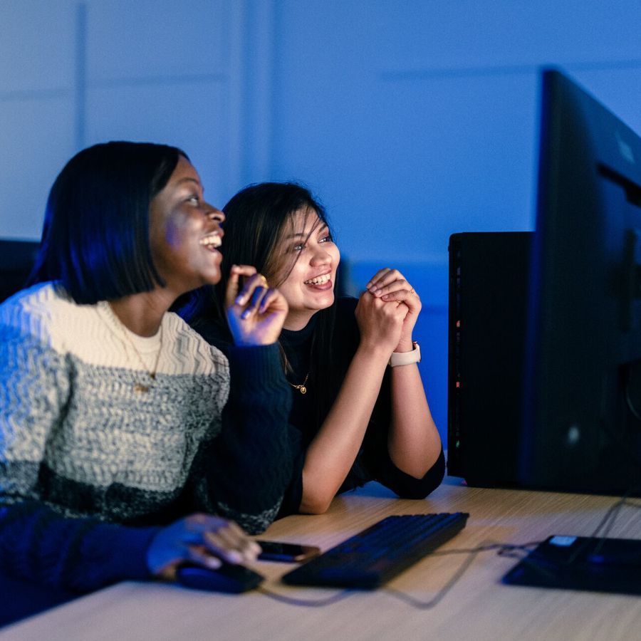 Two students exploring AI