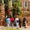 a group of people outside of the historic Wilberforce House