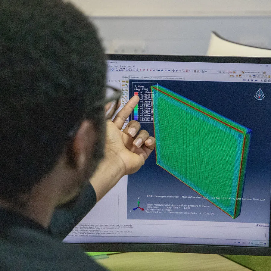 A Steeper partner image of a researcher at the computer screen