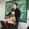 A teacher talking to a class