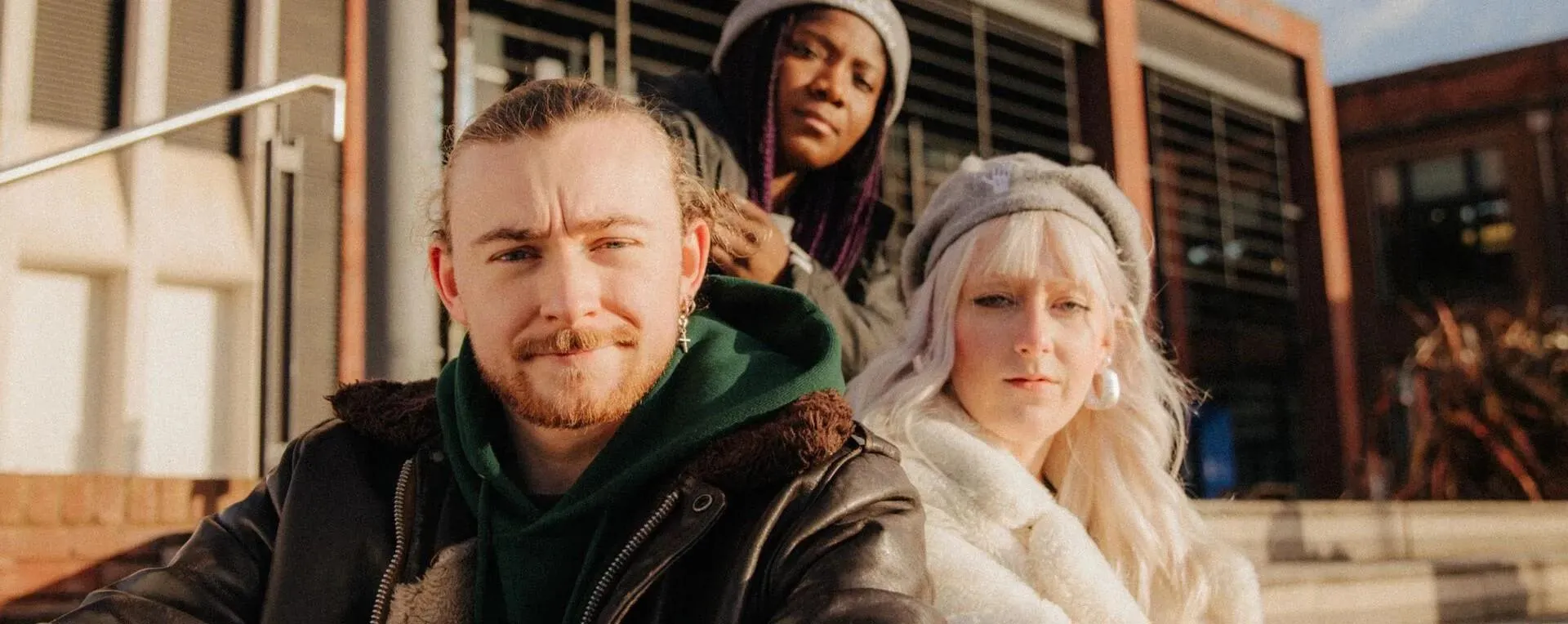 Students sat in front of Brynmor Jones Library
