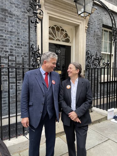 Dr Julie Blake and Poetry By Heart co-director, Tim Shortis MBE – outside No 10.
