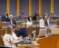 Eluned Morgan talking amongst people