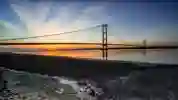 Humber Bridge with sunset behind it