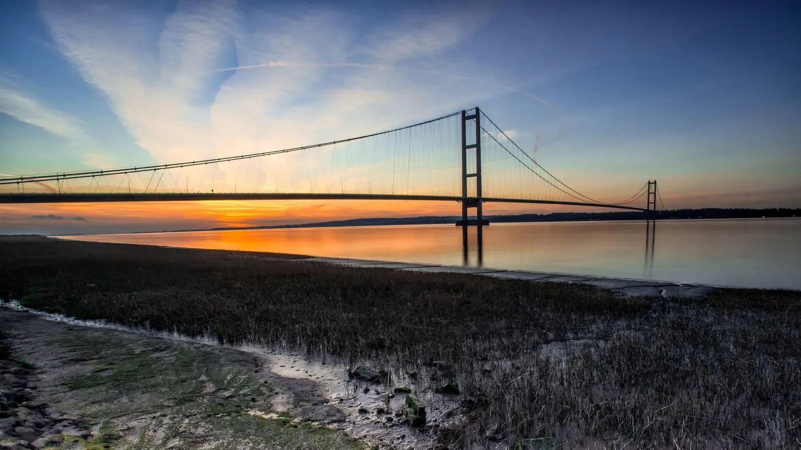 Humber Bridge with sunset behind it