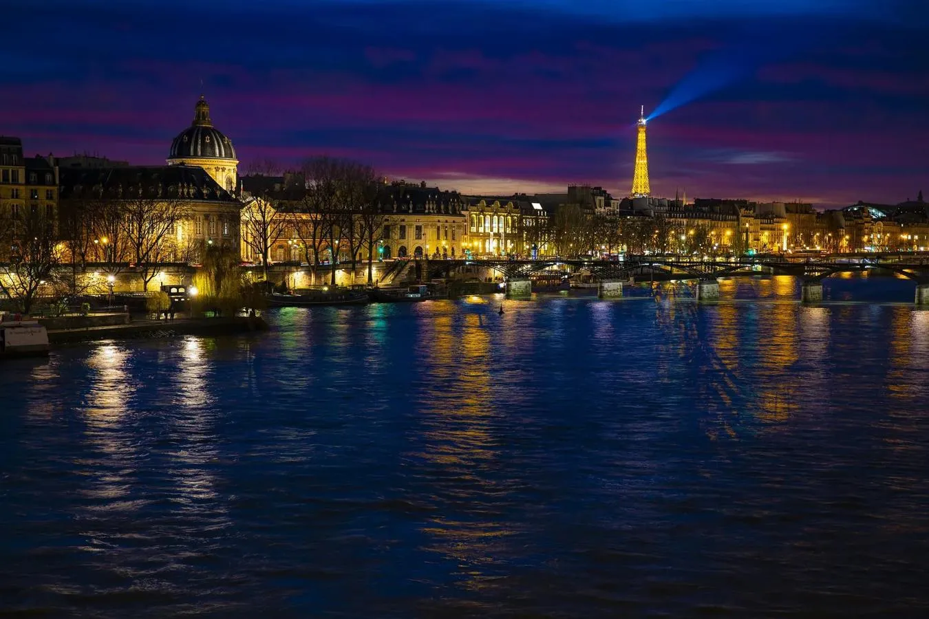Night view across the River Seine towards the Eiffel Tower